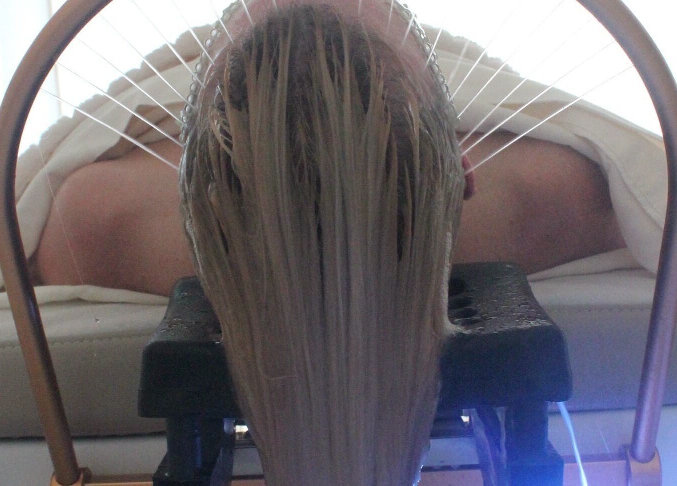 Relaxing head spa treatment at Restored Beauty Bar and Head Spa in Richmond, Virginia, US promoting wellness.