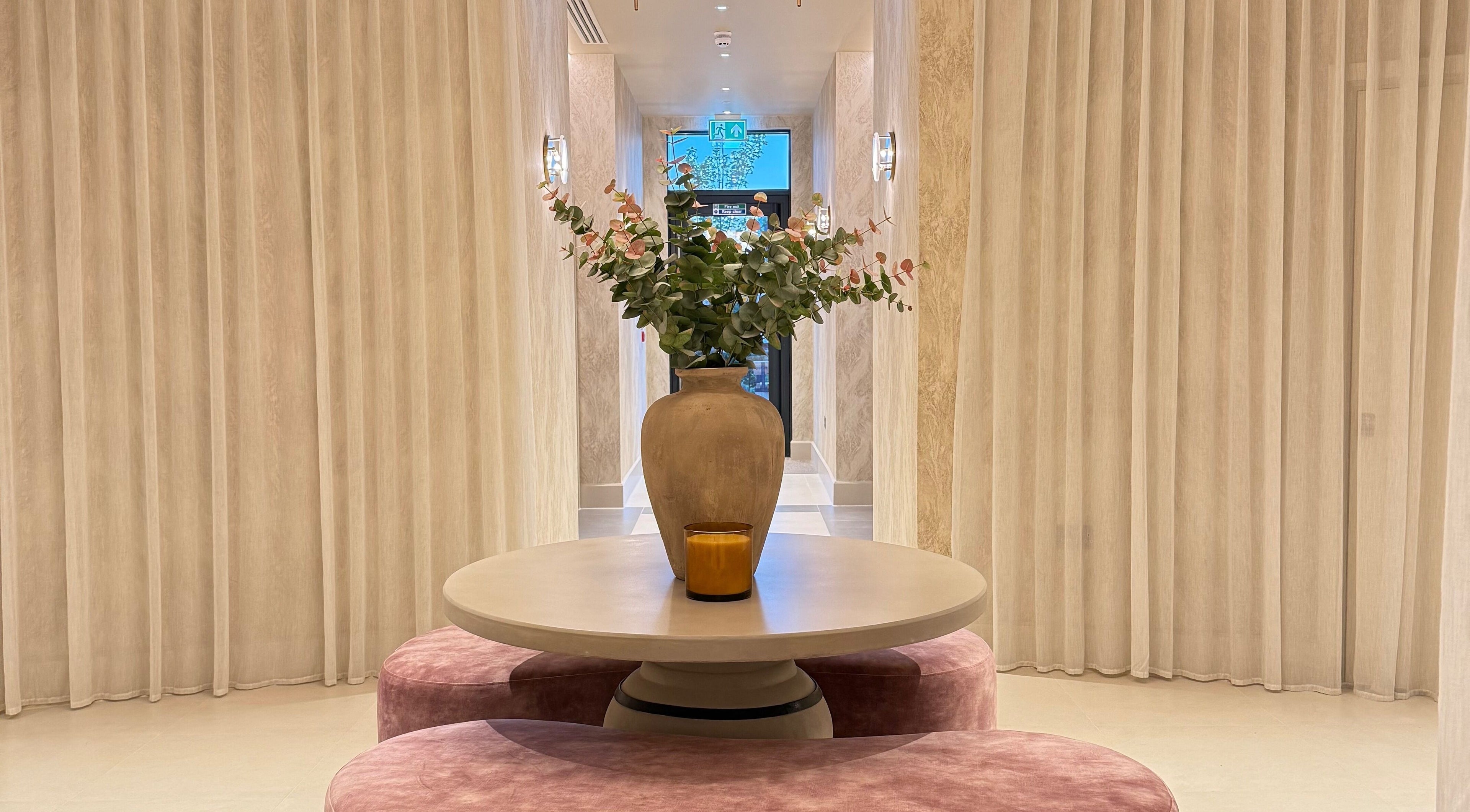 Stylish vase on table in Exhale By Elegance, Stapleford, England, GB. Serene and inviting wellness venue decor.