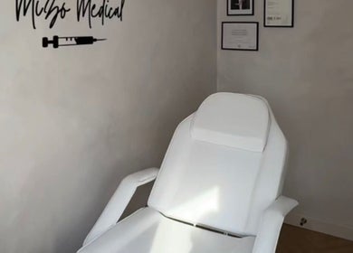 Modern treatment chair at Mizo Medical Aesthetics, Hazel Grove, England, GB, showcasing a serene ambiance.