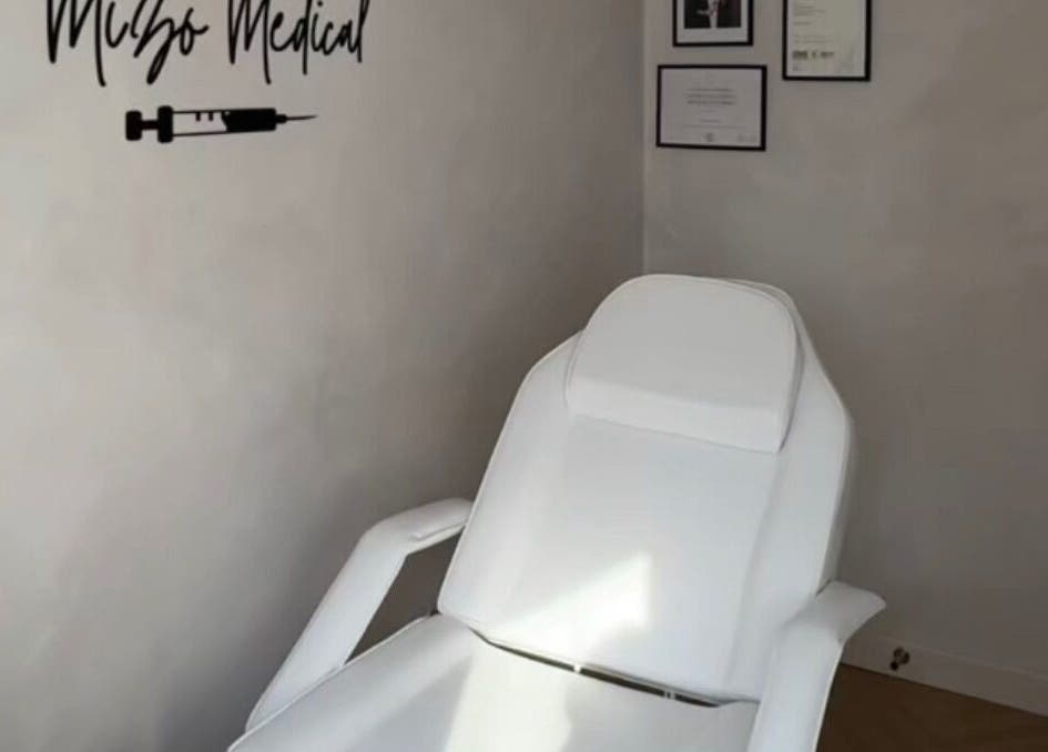 Modern treatment chair at Mizo Medical Aesthetics, Hazel Grove, England, GB, showcasing a serene ambiance.