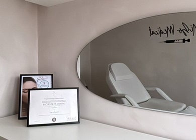 Calm treatment room at Mizo Medical Aesthetics, Hazel Grove, England, GB with diploma and sleek decor.