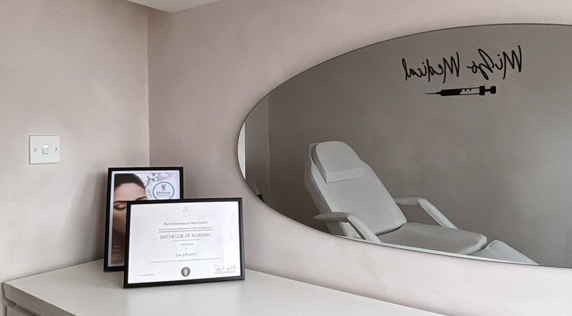 Calm treatment room at Mizo Medical Aesthetics, Hazel Grove, England, GB with diploma and sleek decor.