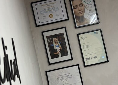 Framed certifications on display at Mizo Medical Aesthetics in Hazel Grove, England, GB.