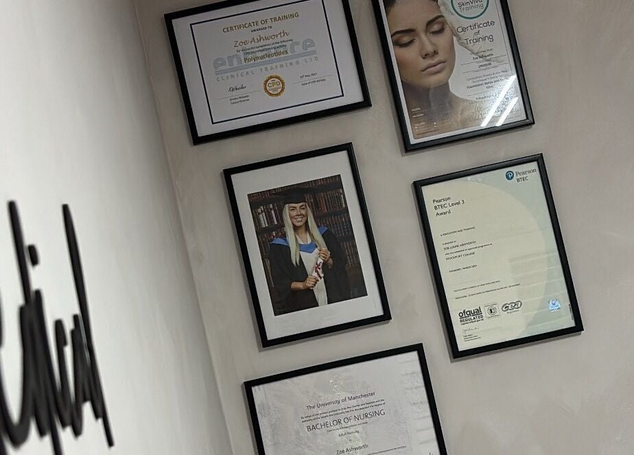Framed certifications on display at Mizo Medical Aesthetics in Hazel Grove, England, GB.