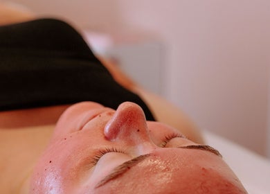 Relaxing facial treatment at Bloom Esthetics in Alabaster, Alabama, US, showcasing smooth skin care.