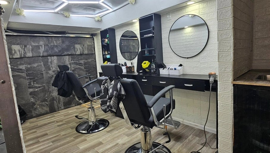 Chic interior of Mefalani Mobile Barbershop, Thorndale, Ontario, CA, featuring two stylish barber chairs.