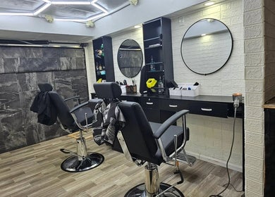 Chic interior of Mefalani Mobile Barbershop, Thorndale, Ontario, CA, featuring two stylish barber chairs.