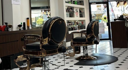 Stylish vintage chairs at Top Fade Barbers in Melbourne, Victoria, AU, highlighting luxury barber experience.