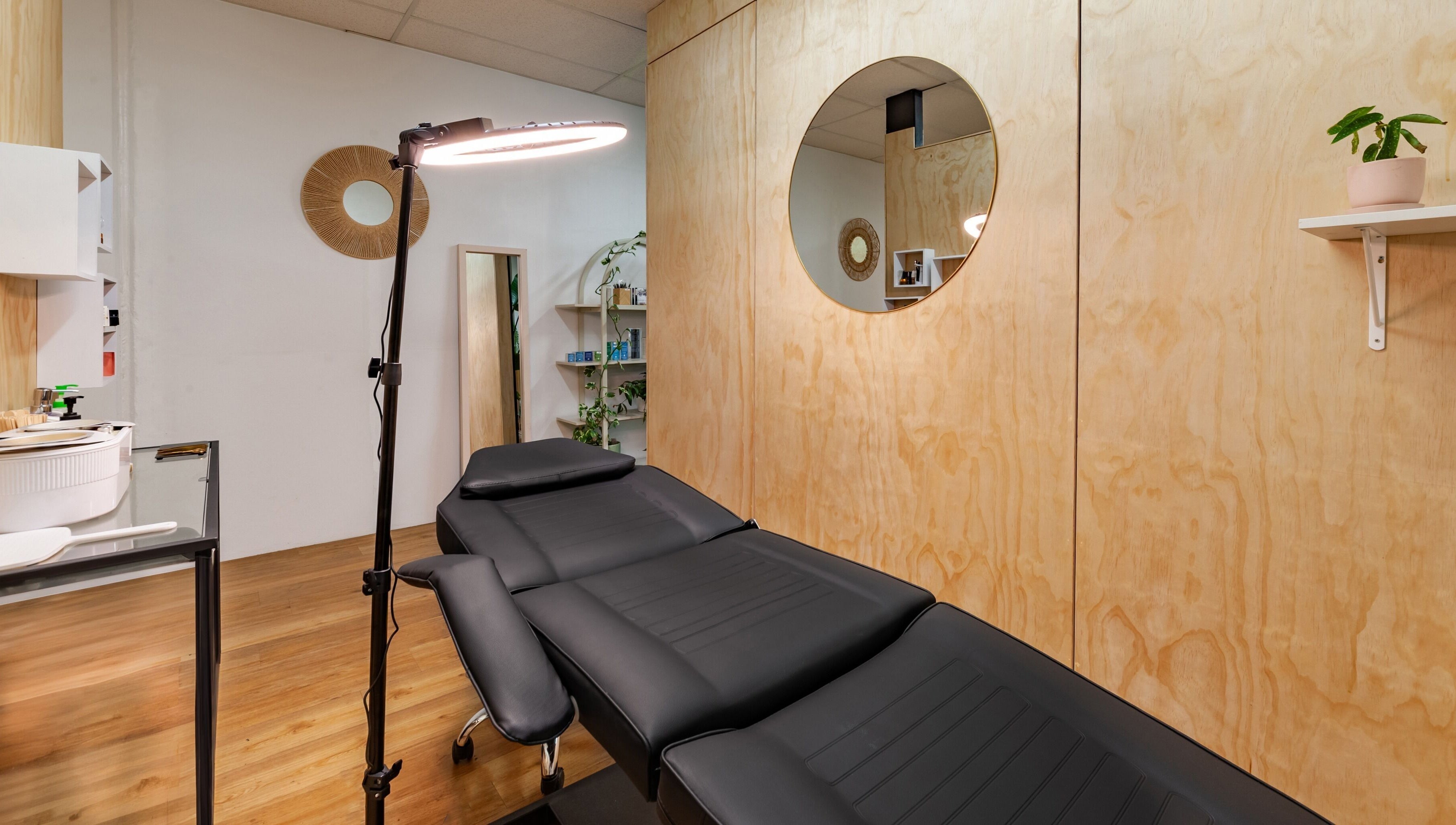 Modern beauty treatment room at Brows Defined in Christchurch, Waitaha, NZ with calming natural accents.