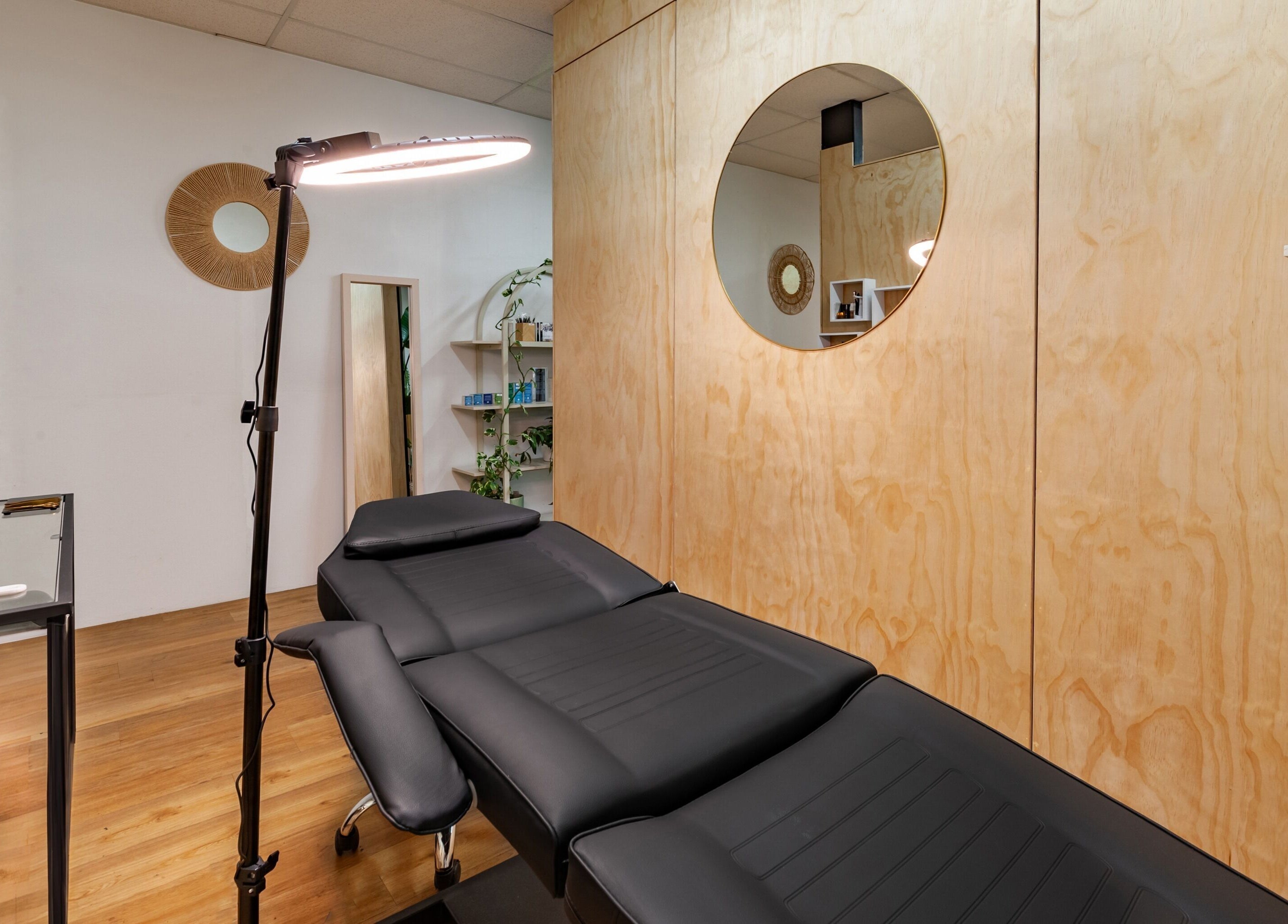 Modern beauty treatment room at Brows Defined in Christchurch, Waitaha, NZ with calming natural accents.