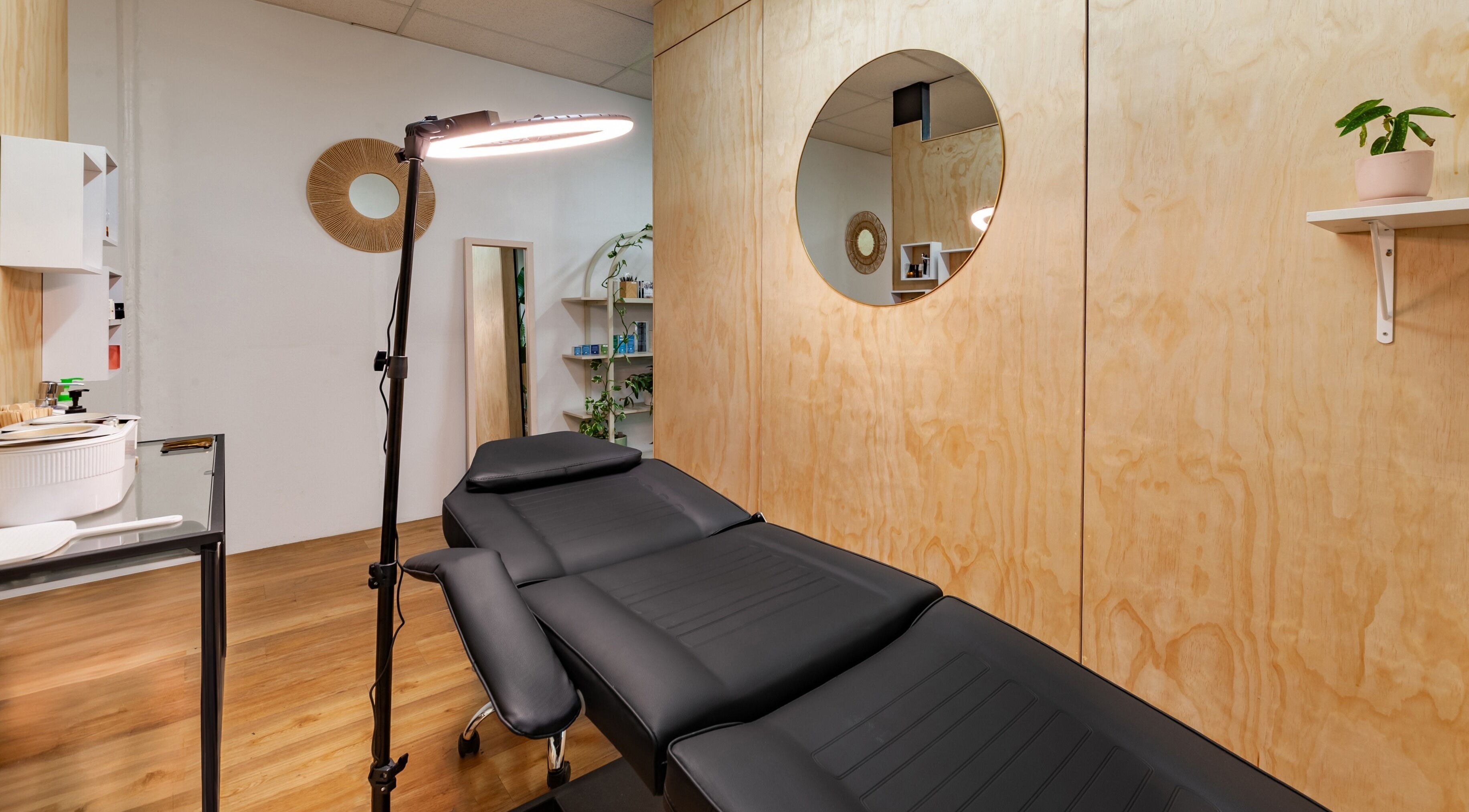 Modern beauty treatment room at Brows Defined in Christchurch, Waitaha, NZ with calming natural accents.
