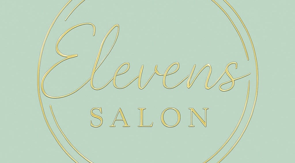 Elevens Salon logo in gold script on green, located in Morecambe, England, GB.