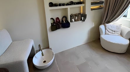 Relaxing treatment room at The Celine Spa in Swanley, England, GB with elegant furnishings and calming ambiance.