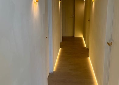 Elegant hallway with soft lighting at The Celine Spa, Swanley, England, GB.