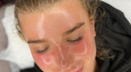 A satisfied client with glowing skin after a facial at Anna Does Skin, Surfers Paradise, Queensland, AU.