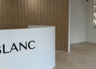 Modern reception at Anna Does Skin, Surfers Paradise, Queensland, AU, showcasing sleek minimalist design.
