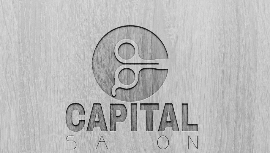 Capital barber (صالون العاصمة) logo engraved on wood, Amman, Amman Governorate, JO
