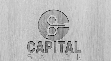Capital barber (صالون العاصمة) logo engraved on wood, Amman, Amman Governorate, JO