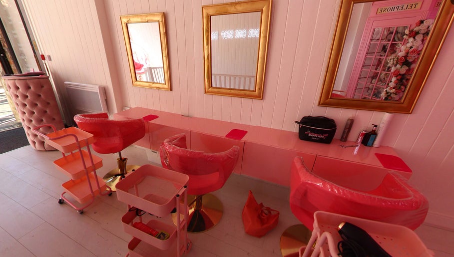 Chic interior of Petal Beauty by Lydia in Derby, England, GB, showcasing pink chairs and elegant decor.