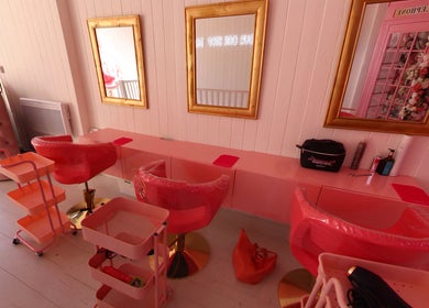 Chic interior of Petal Beauty by Lydia in Derby, England, GB, showcasing pink chairs and elegant decor.