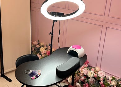 Nail station at Petal Beauty by Lydia in Derby, England, GB, with pink decor and flower accents.