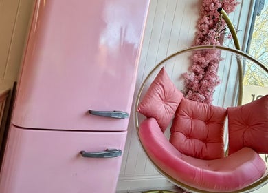 Chic pink decor at Petal Beauty by Lydia, Derby, England, GB, featuring a stylish chair and floral accents.