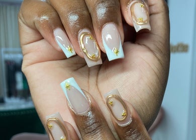 Intricate gold-accented nails by By Shanice in Falmouth, Trelawny Parish, JM.