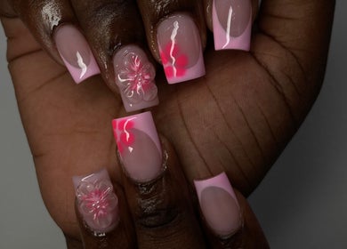 Elegant pink nail art with 3D floral design at By Shanice, Falmouth, Trelawny Parish, JM.