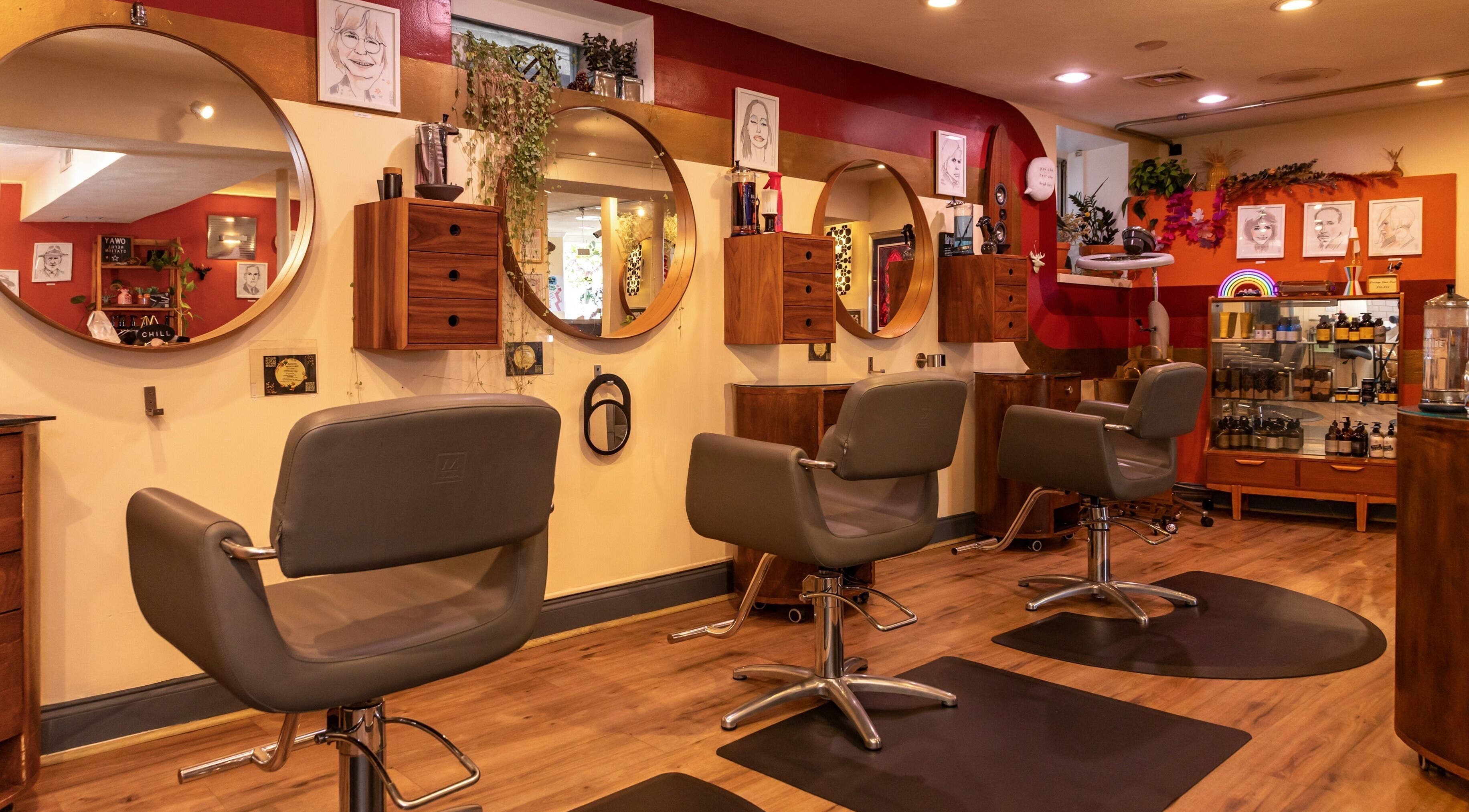 Chic interior of Flipp Salon and Apothecary in Providence, Rhode Island, US with stylish salon chairs.