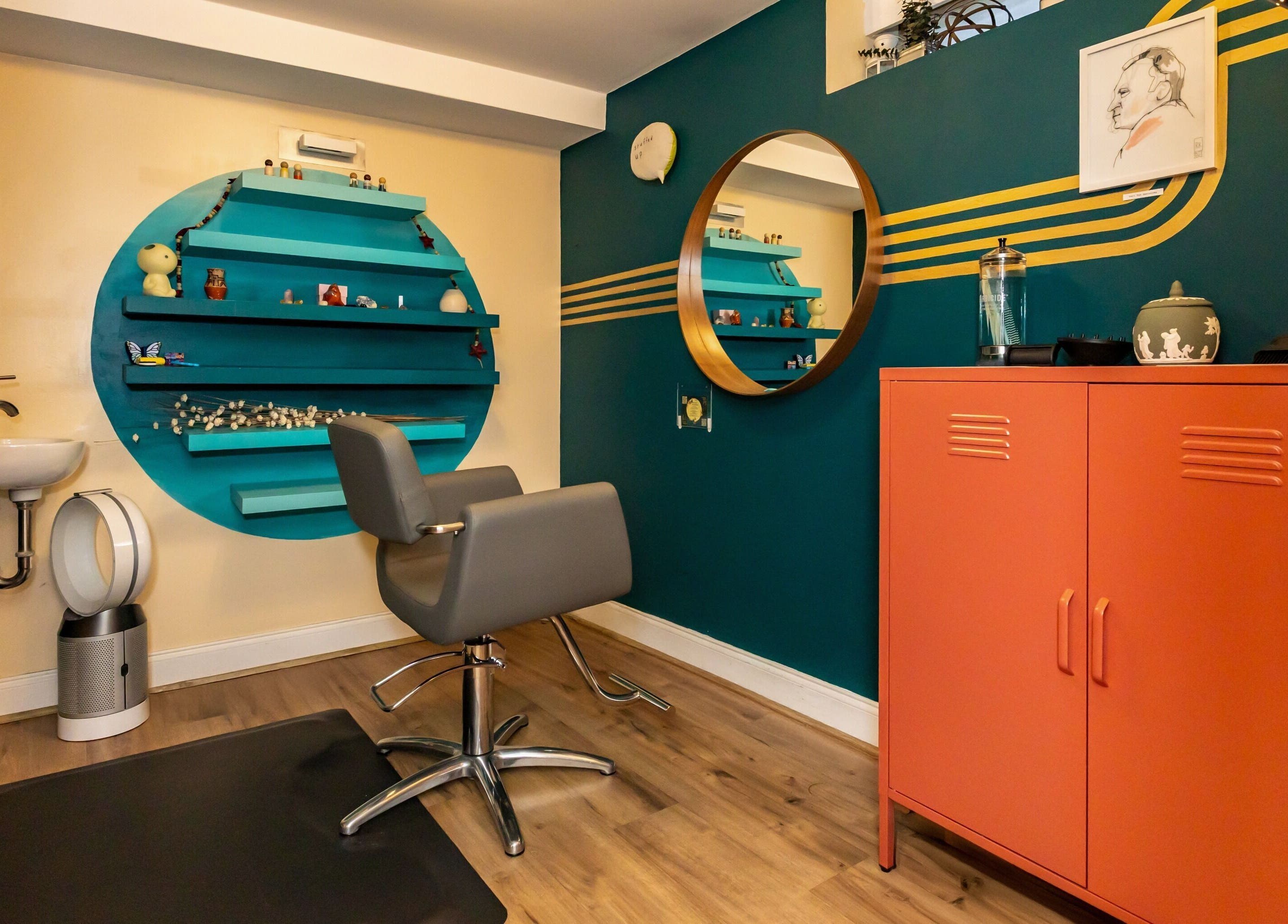 Modern salon station at Flipp Salon and Apothecary in Providence, Rhode Island, US, featuring stylish decor.