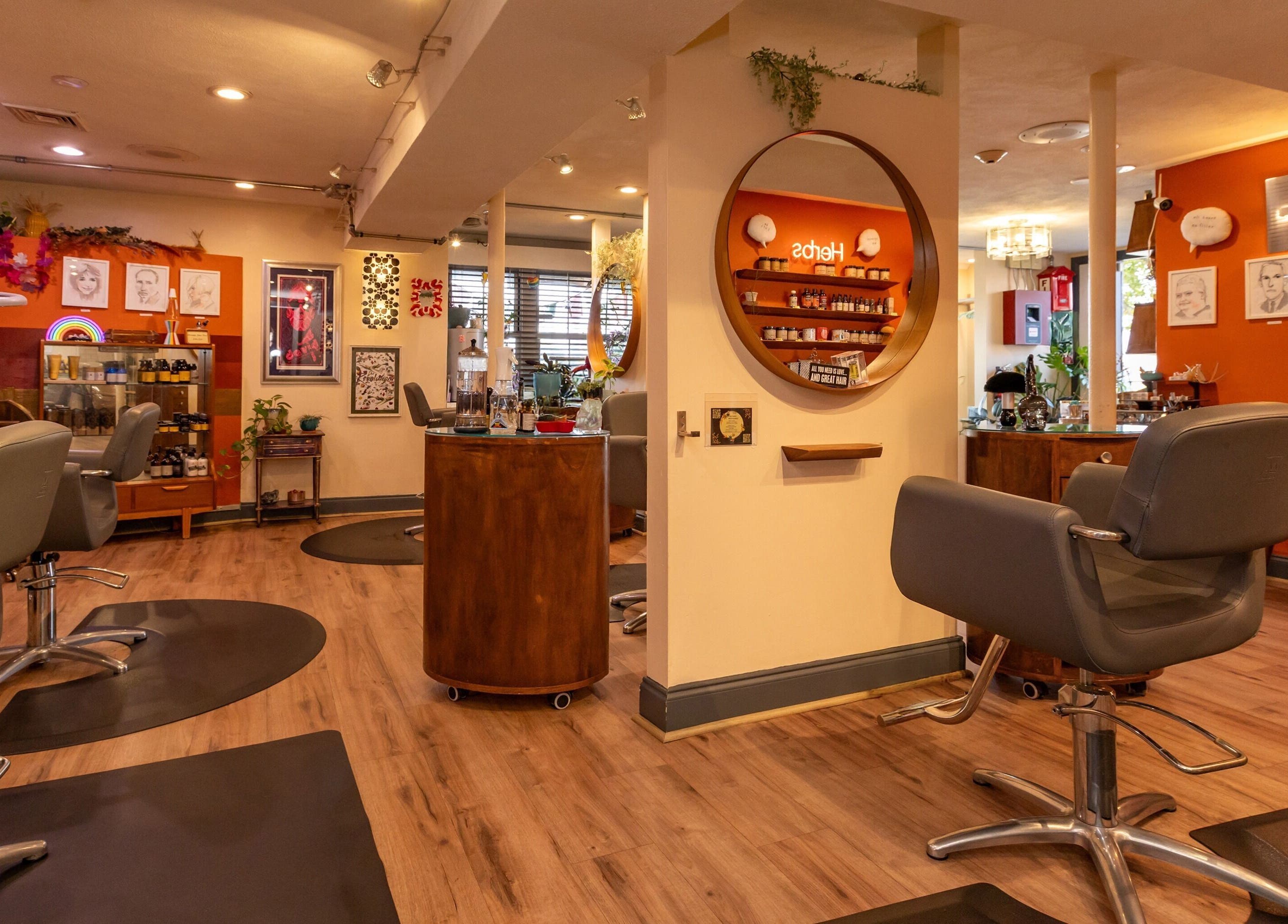 Chic salon interior at Flipp Salon and Apothecary, Providence, Rhode Island, US, featuring elegant decor and seating.