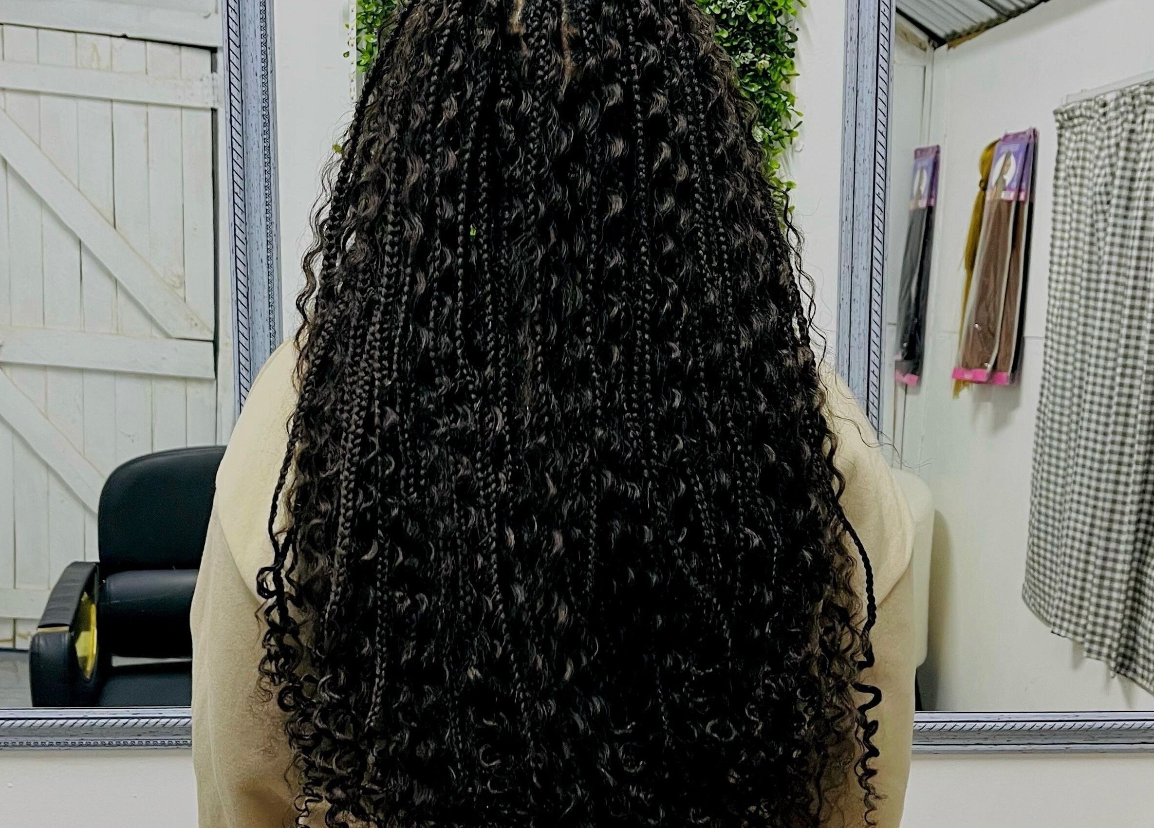 Intricate braided hairstyle at Sphiwe Beauty Studio, Pretoria, Gauteng, ZA. Reflects expert styling.
