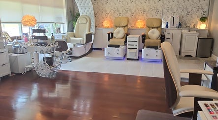 Elegant nail spa chairs at Nail club&spa in West Caldwell, New Jersey, US, offering a serene ambiance.