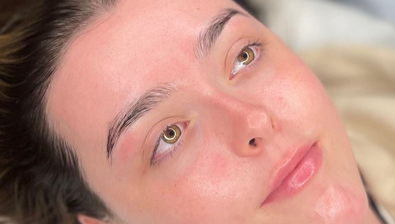 Close-up of a woman's glowing skin after a spa treatment at Glow By Molly in Tywyn, Wales, GB.