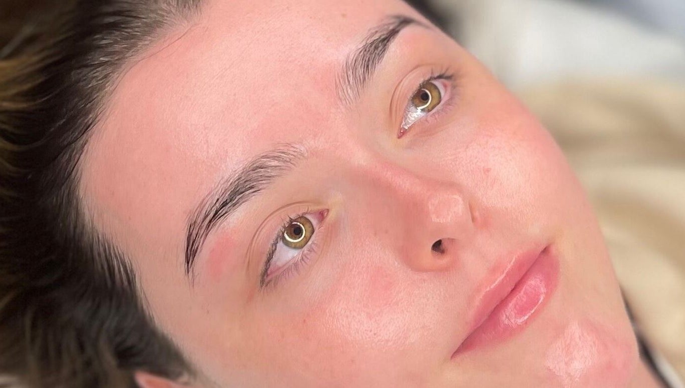 Close-up of a woman's glowing skin after a spa treatment at Glow By Molly in Tywyn, Wales, GB.