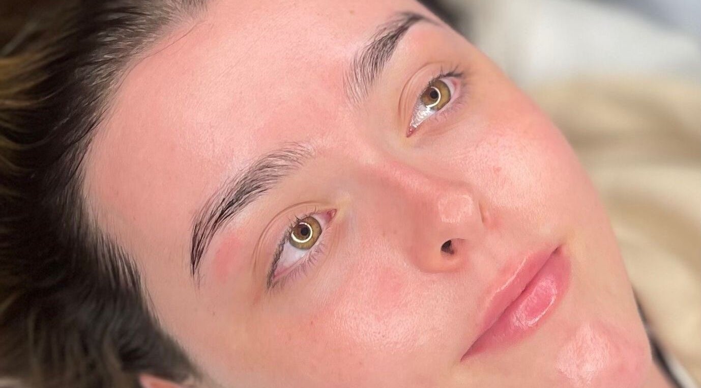 Close-up of a woman's glowing skin after a spa treatment at Glow By Molly in Tywyn, Wales, GB.