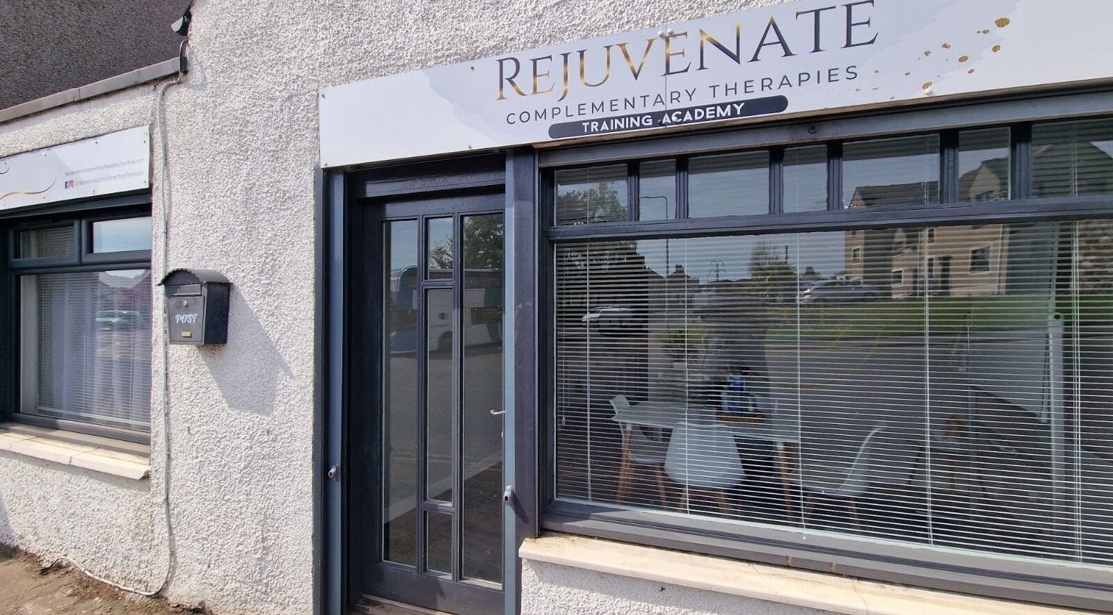 Exterior of Boyd Beauty in Kennoway, Scotland, GB featuring large windows and signage for complementary therapies.