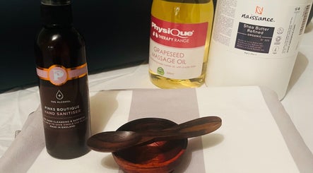 Therapy oils and wooden bowl at Peak Recovery Sports Therapy, Frampton Cotterell, England, GB.