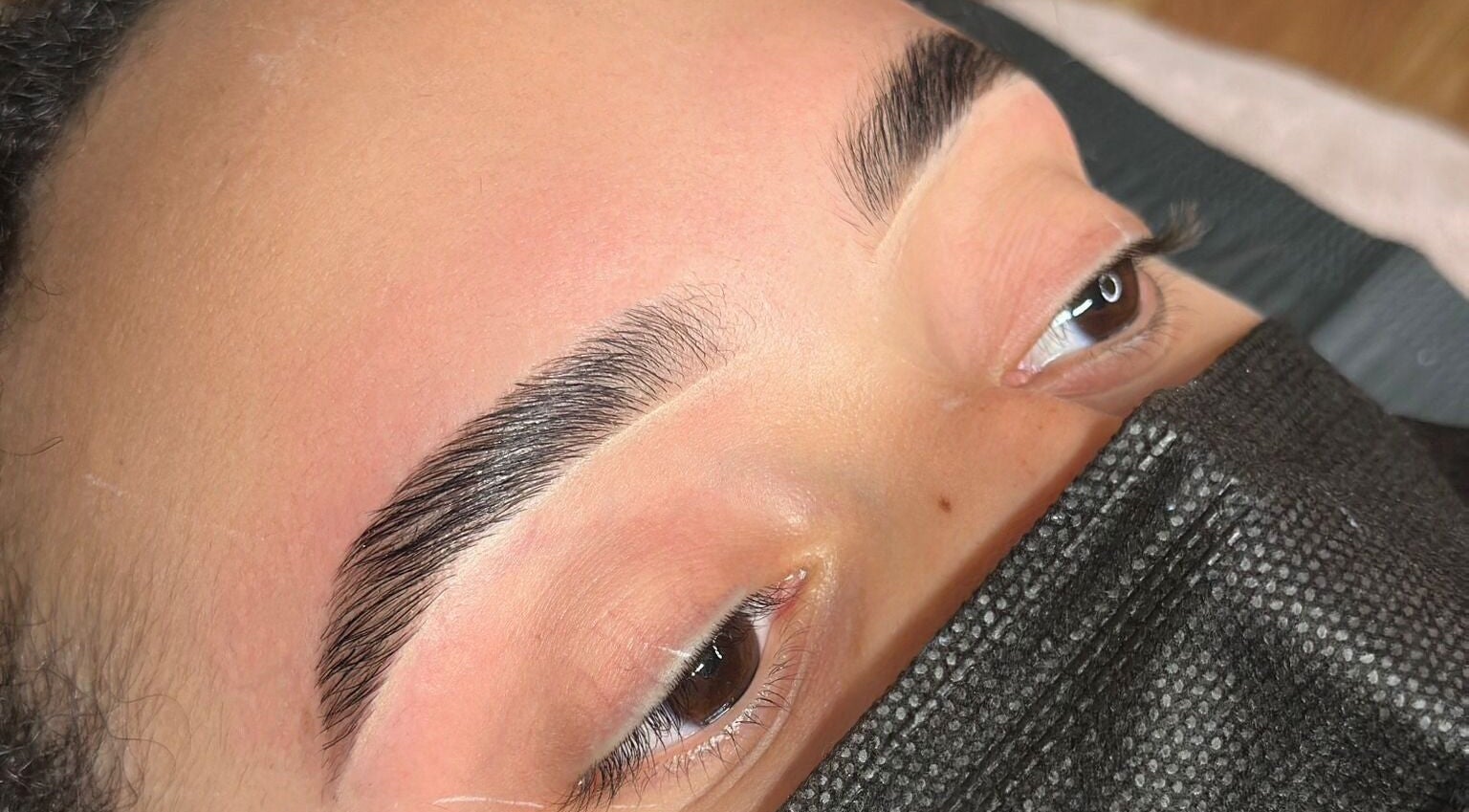 Perfectly shaped eyebrows at Denisse Lashes in Salem, New Hampshire, US, enhance natural beauty.