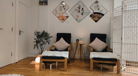 Relaxing chairs in a serene room at Meditation TaiChi TCM Health Centre, London, England, GB.