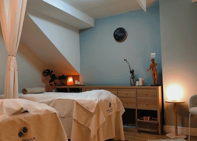 Serene treatment room at Meditation TaiChi TCM Health Centre, London, England, GB with soothing decor.