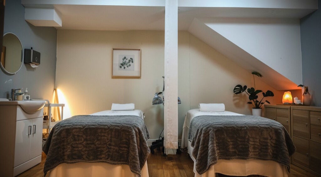 Dual massage beds in serene room at Meditation TaiChi TCM Health Centre, London, England, GB.