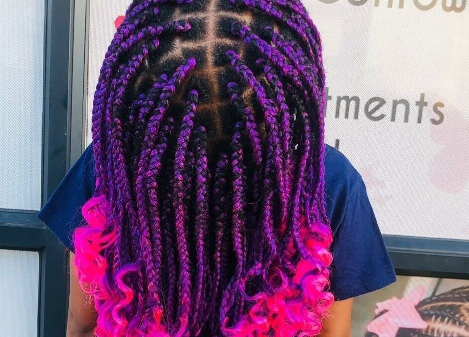 Colorful braided hairstyle at Nthaby PrettyKids Salon, Pretoria East, Gauteng, ZA.