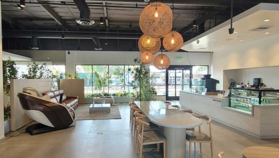Relaxing lounge area at Skiness in West Hollywood, California, US, featuring modern decor and ample natural light.