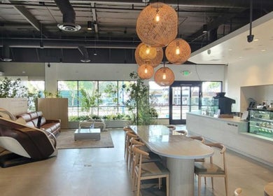 Relaxing lounge area at Skiness in West Hollywood, California, US, featuring modern decor and ample natural light.