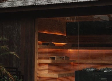 Warm wooden sauna at The Ark | Social Recovery Club, Bali, Bali, ID offers a relaxing atmosphere.