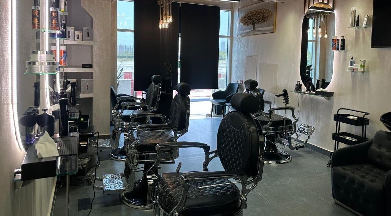 Elegant interior of The Classic Barber in Dubai, AE featuring modern barber chairs and chic decor.