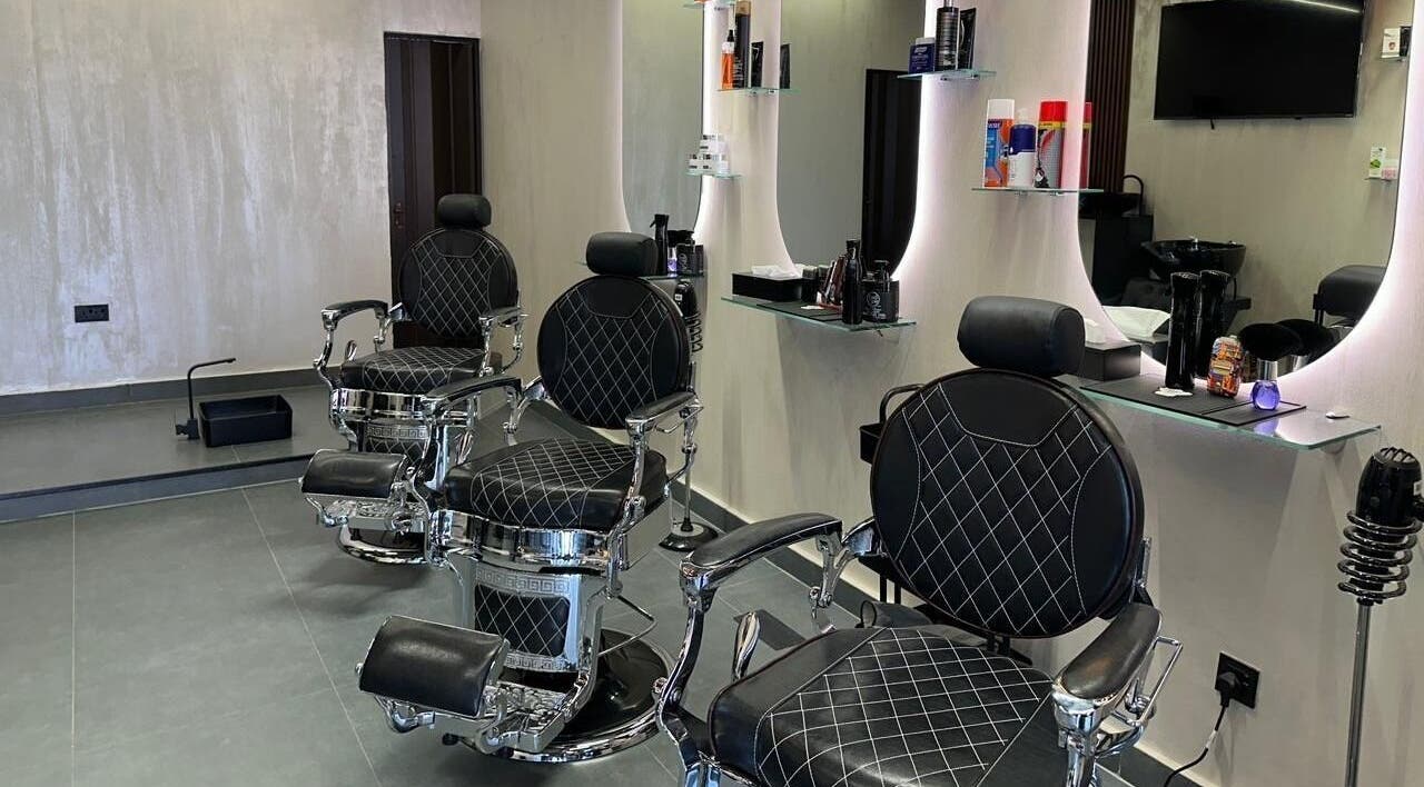 Luxurious barber chairs at The Classic Barber in Dubai, Dubai, AE, showcasing modern elegance and comfort.