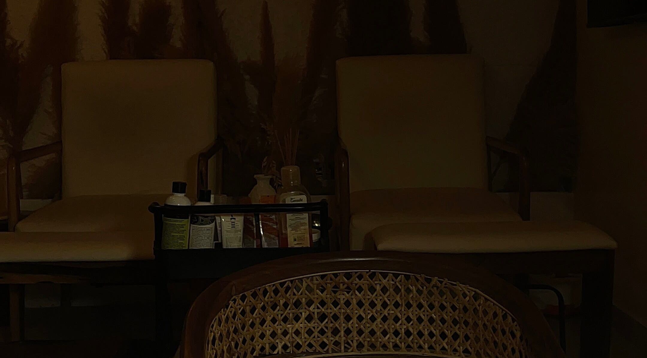 Relaxing spa lounge chairs at 21stluxury.ng, Ikeja, Lagos, NG with wellness products displayed.