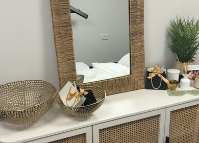 Elegant vanity setup with gold accents at Skin Love Era in Margate, England, GB.